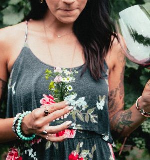 Luxury Wines 7 womens-fashion-tattooed-woman-holding-flowers-and-wine.jpg